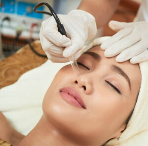 undergoing-darsonvalization-on-facial-skin-7K295Z6.jpg