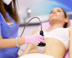 woman-receiving-anti-cellulite-treatment-with-radi-26HDNZX.jpg