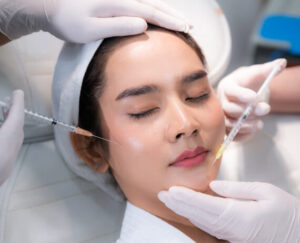 young-asian-woman-making-cosmetology-treatment-ski-X6R8HZZ.jpg